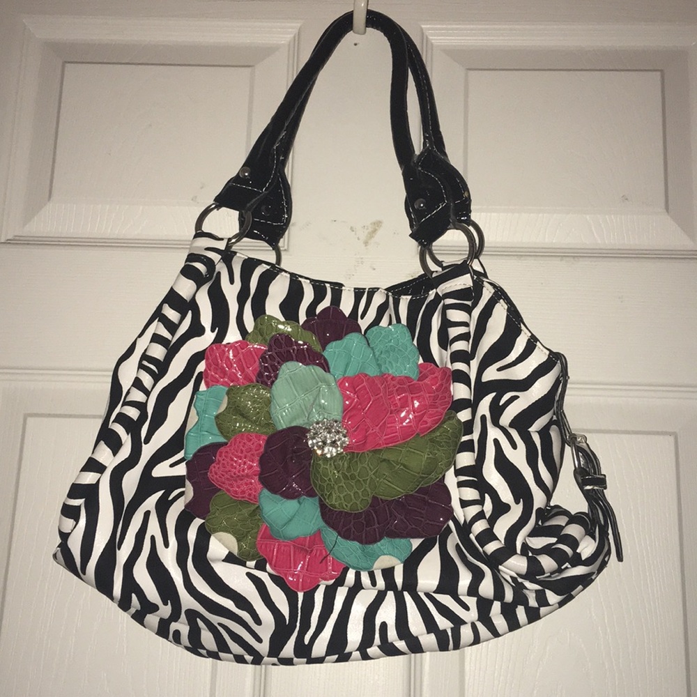 Zebra purse with multi-colored flower in front!